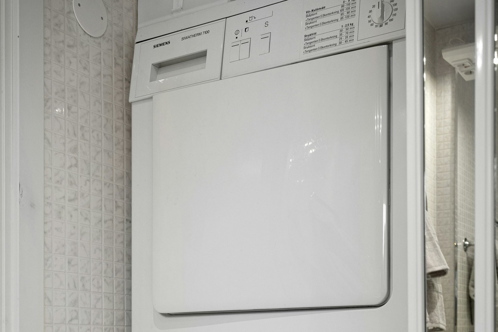 Bedienfeld eines Trockners mit eingestelltem Programm